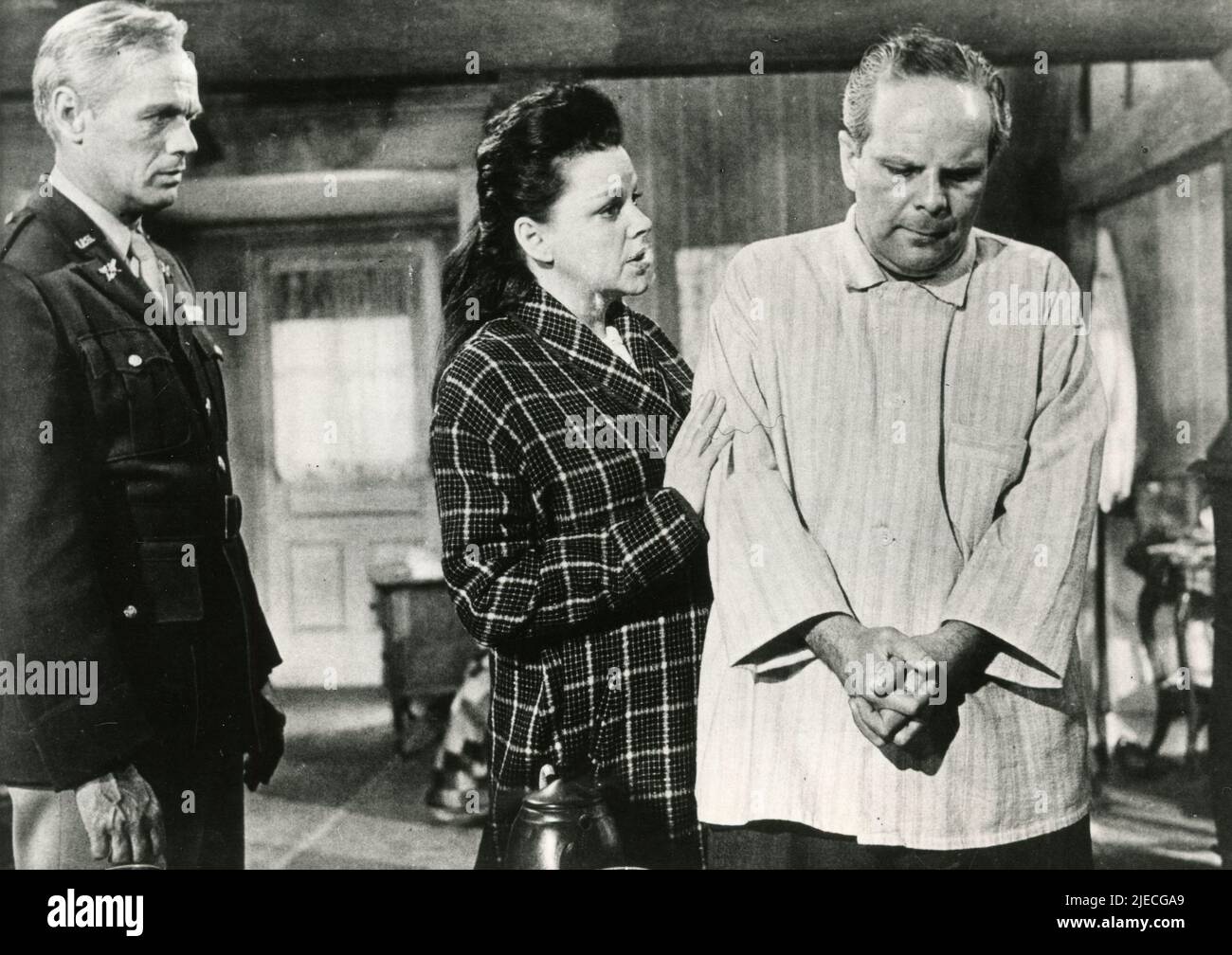 American actors Richard Widmark, Judy Garland, and Howard Caine in the movie Judgment at Nuremberg, USA 1961 Stock Photo