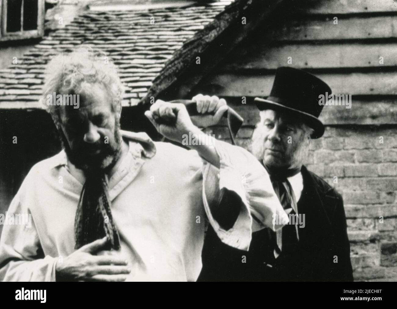 Actors Jonathan Adams and Anthony Bate in the movie Our Exploits at West Poley, UK 1985 Stock Photo