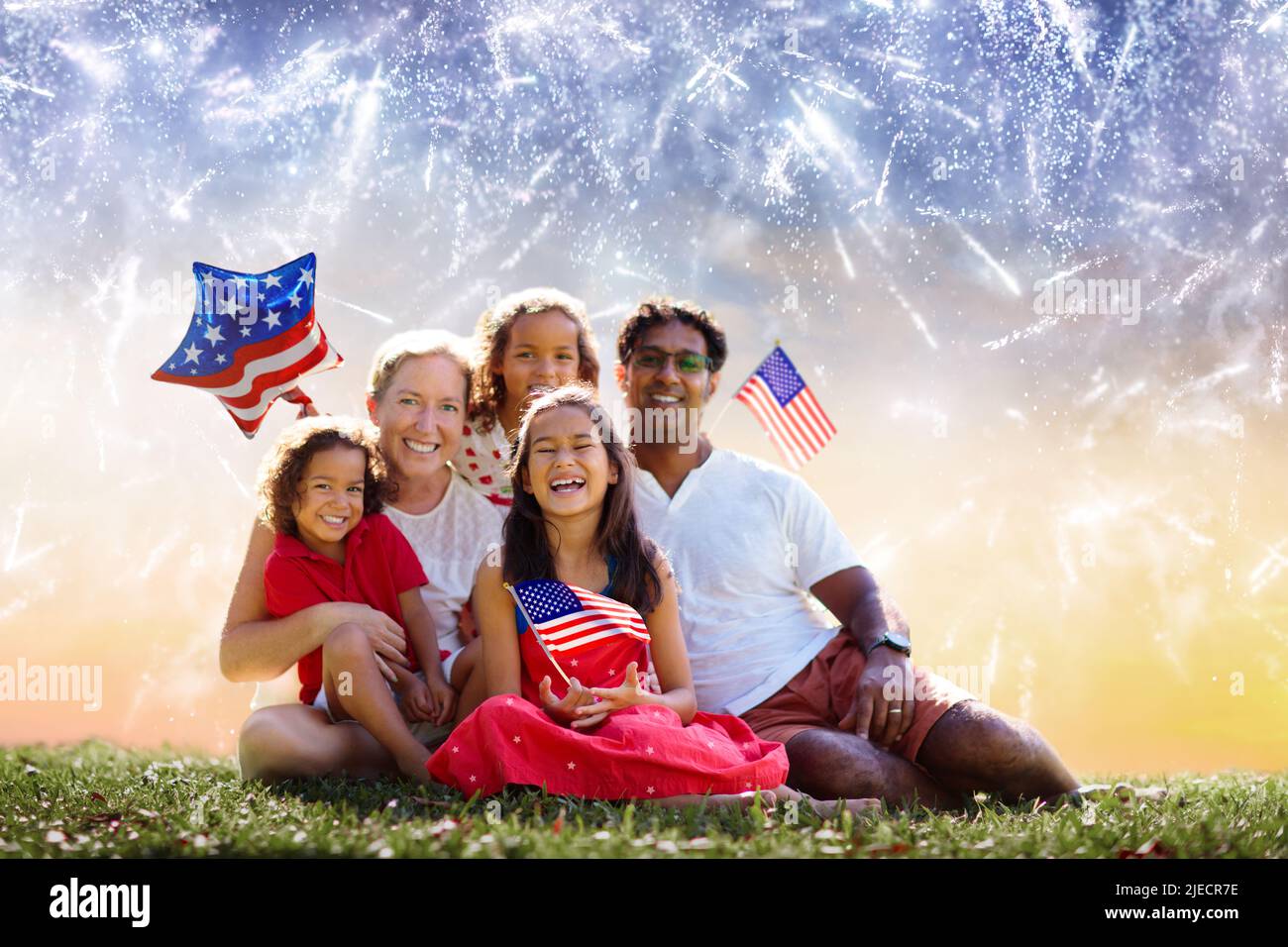 American family celebrating Independence Day. Picnic and fireworks on 4th of July in America 