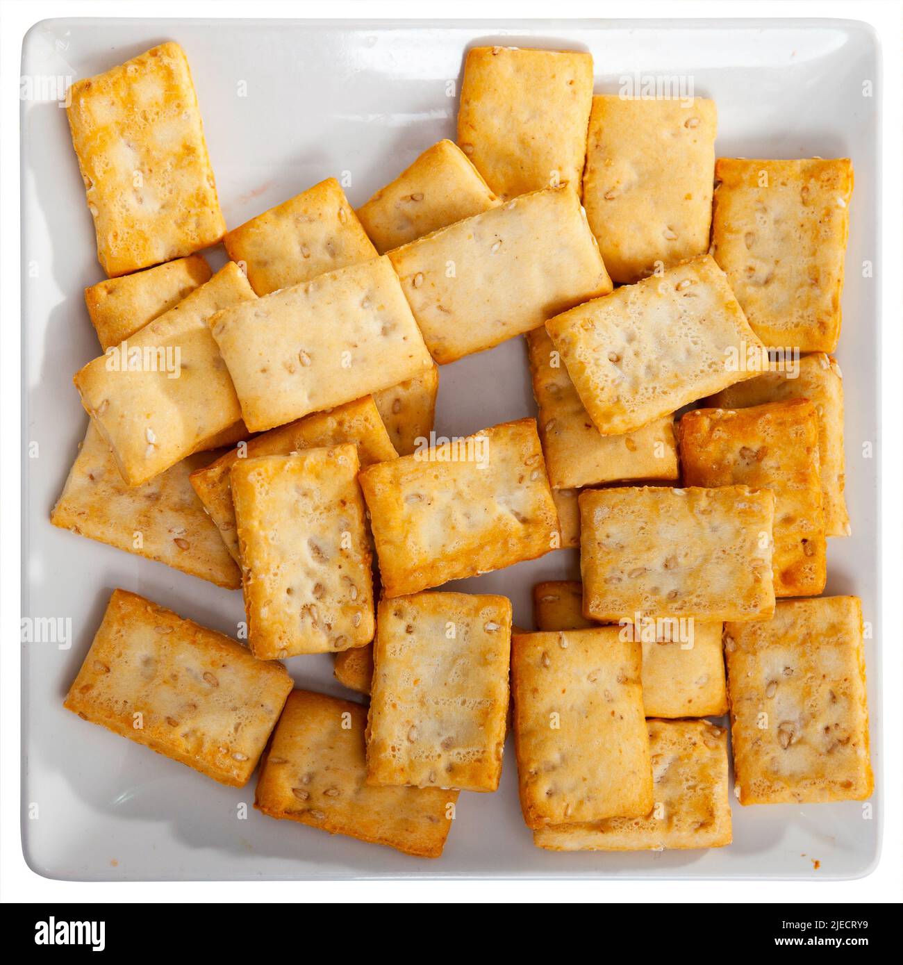 Thin crackers with sesame seeds on plate Stock Photo Alamy