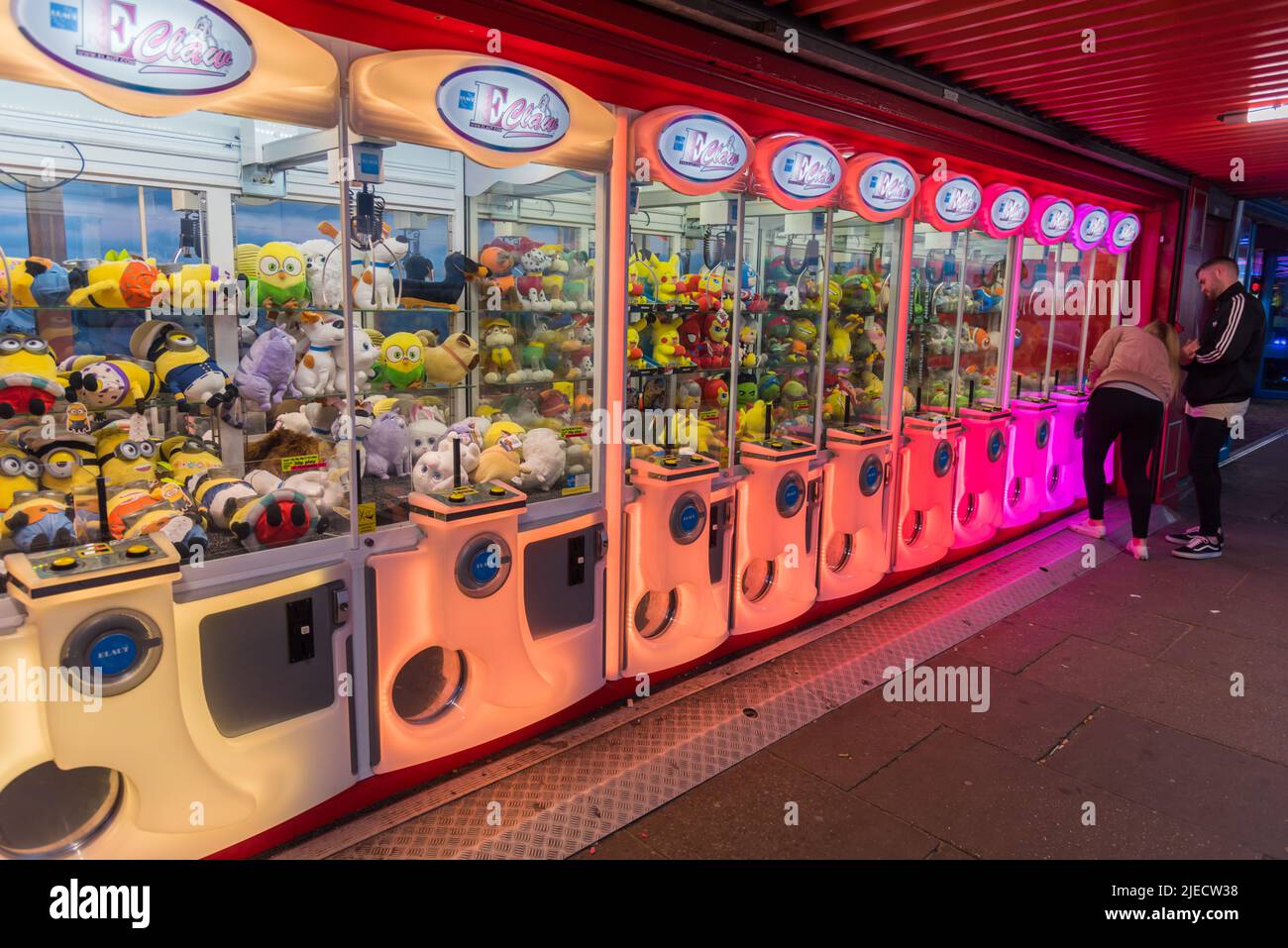 Amusement park interior lit up Stock Photo
