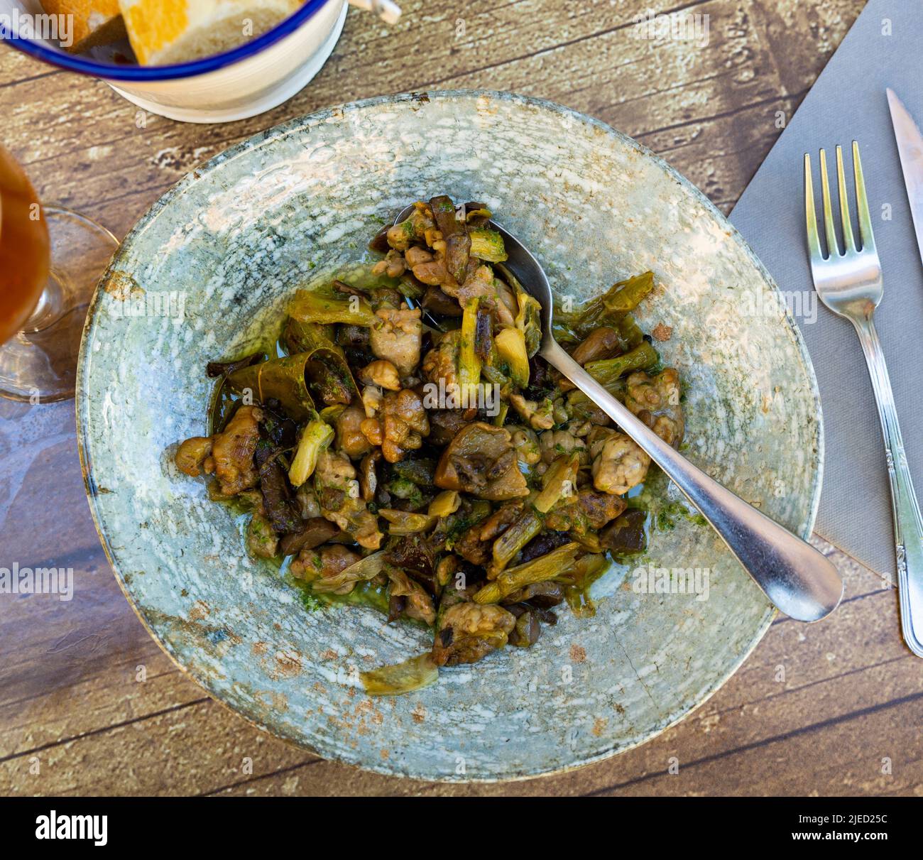 Lechecillas de ternasco. Roasted lamb gizzards served with stewed ...