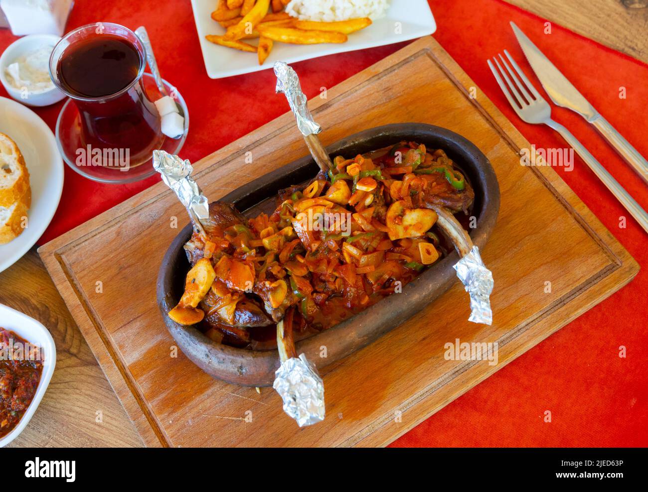 Festive table with lamb chop casserole Stock Photo - Alamy