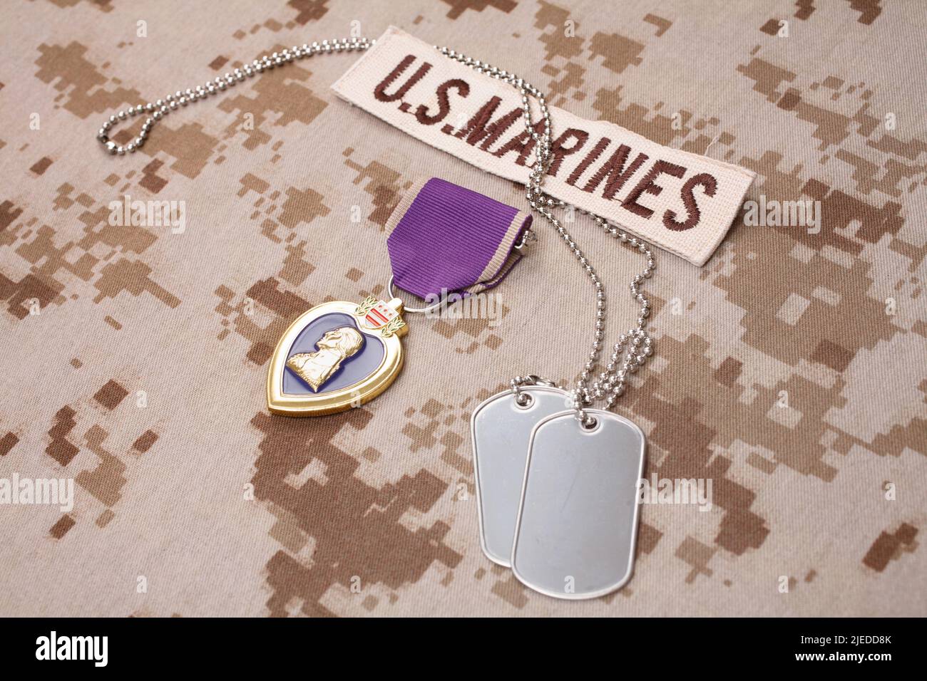 KYIV, UKRAINE - August 23, 2016. Purple Heart award on US MARINES camouflage uniform Stock Photo