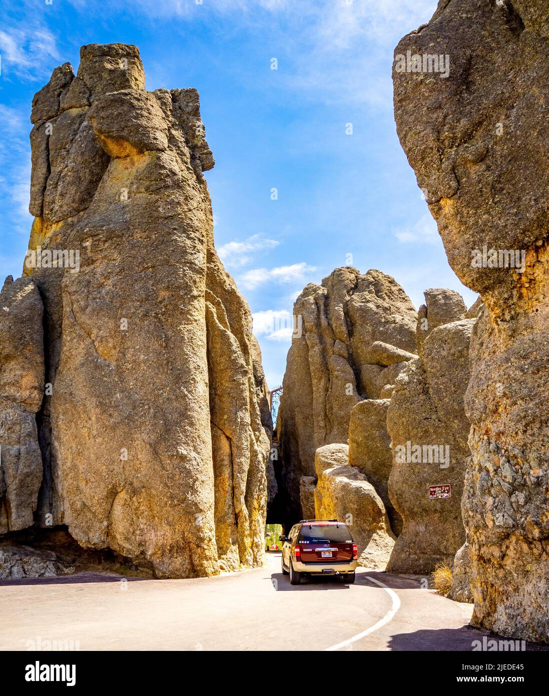 Car in Needles Eye Tunnel on the Needles Highway in Custer State Park ...