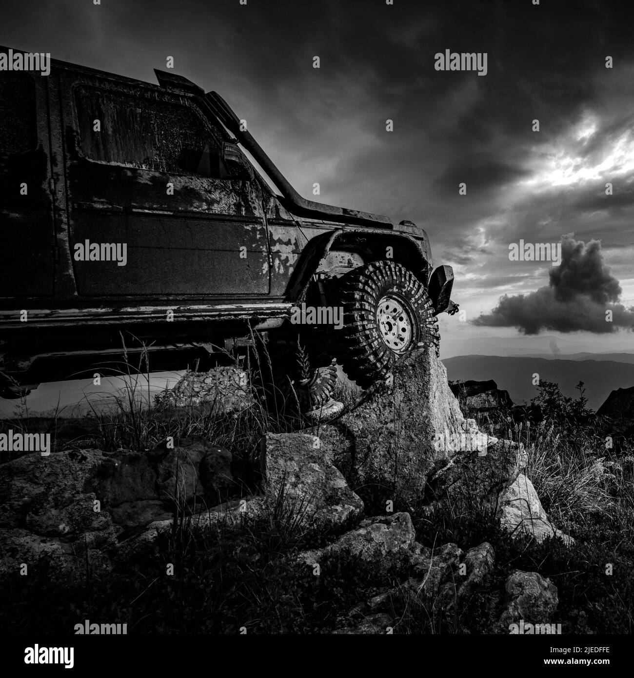 Water splash in offroad racing. Off road jeep expedition to the villages on mountain road Stock