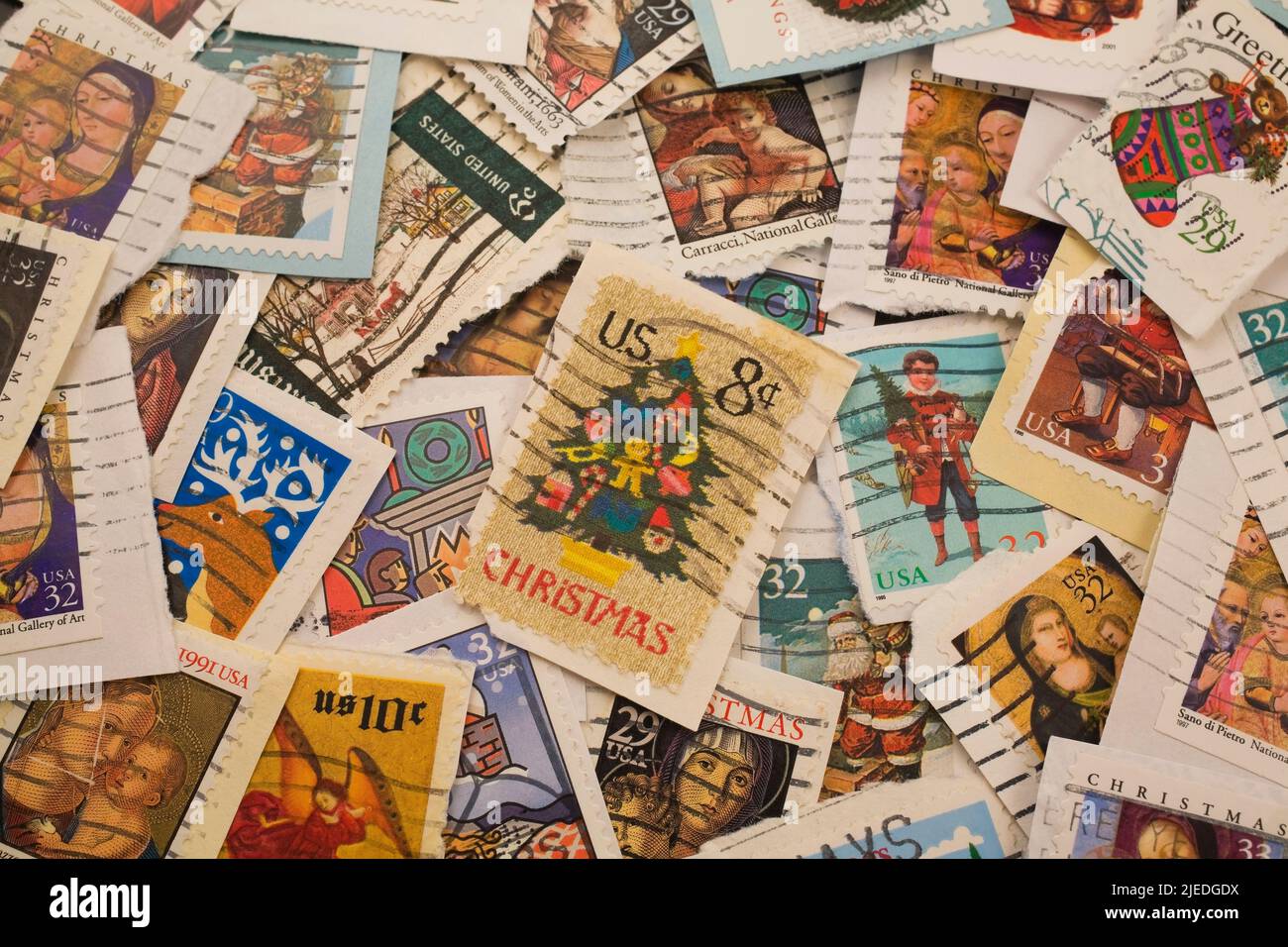 Close-up of old United States postage stamps commemorating Christmas. Stock Photo