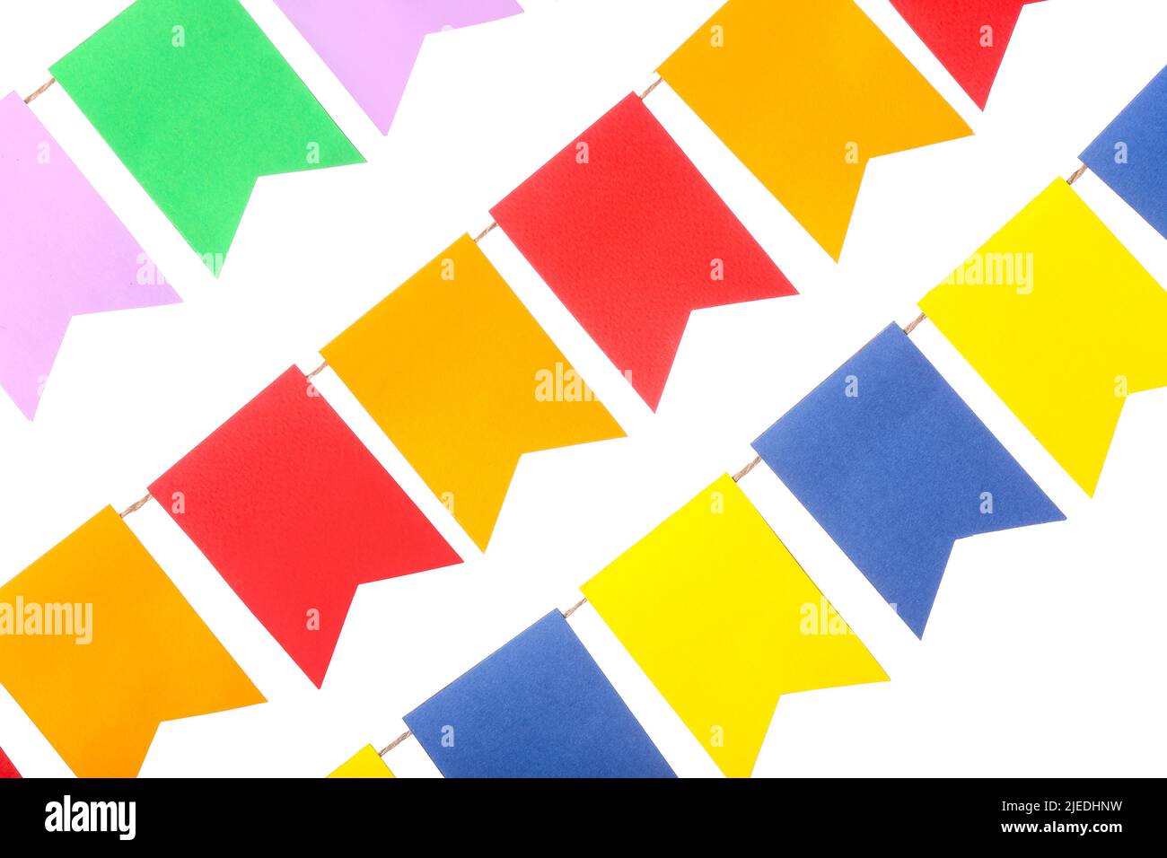 Colorful festive bunting flags on white background Stock Photo - Alamy