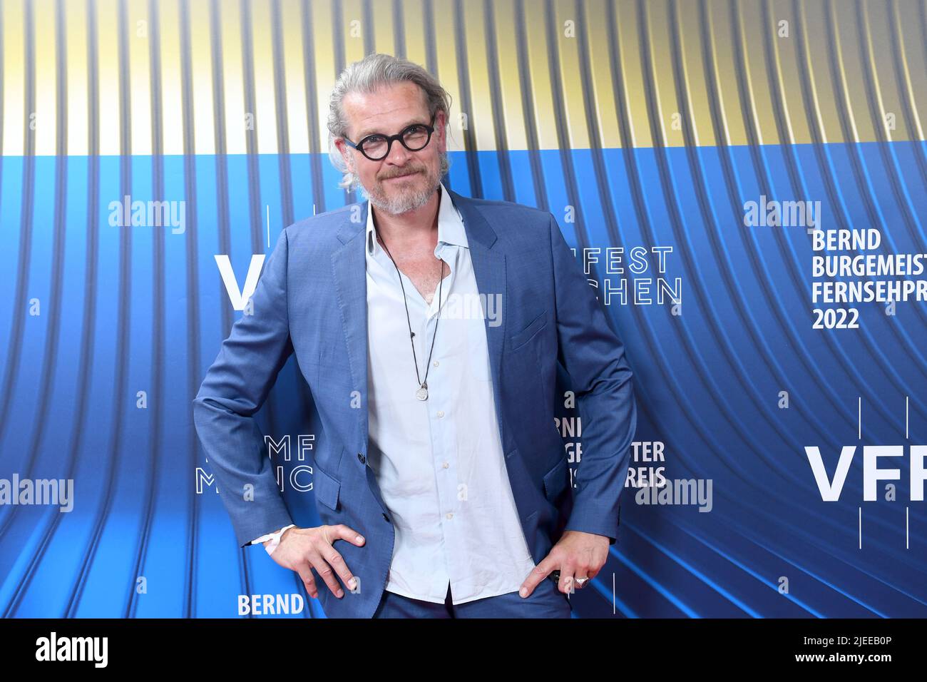 Munich, Germany. 26th June, 2022. Actor Götz Otto comes to the Bernd Burgemeister Television Award ceremony at the Gloria Palast as part of the Munich Film Festival. Credit: Felix Hörhager/dpa/Alamy Live News Stock Photo