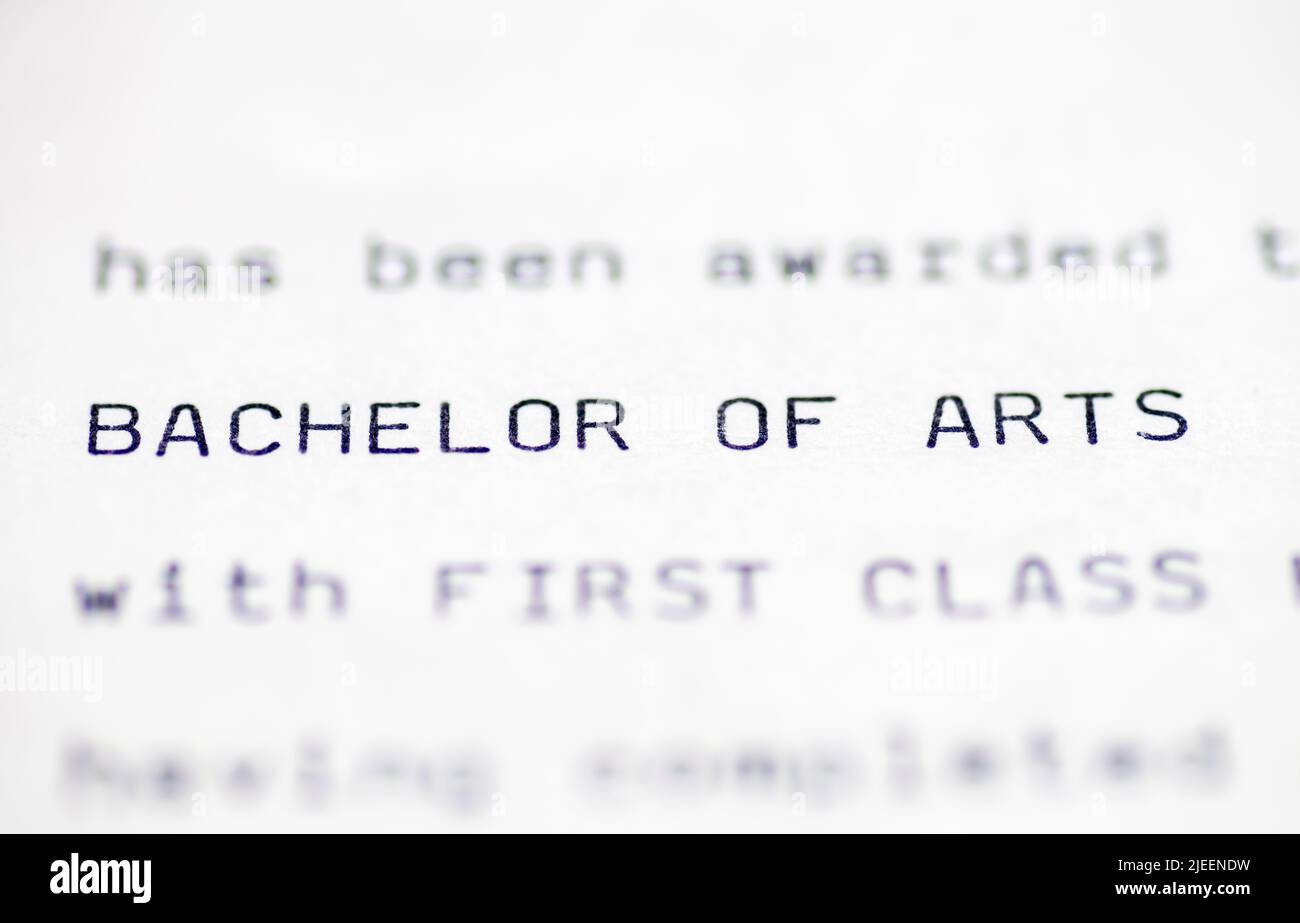 Close up of a higher education certificate with the holder having achieved a Bachelor of Arts degree with first class honours. Stock Photo