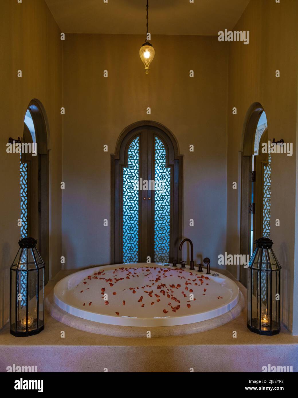 romantic bathtub with rose petals, luxury vacation in a jacuzzi