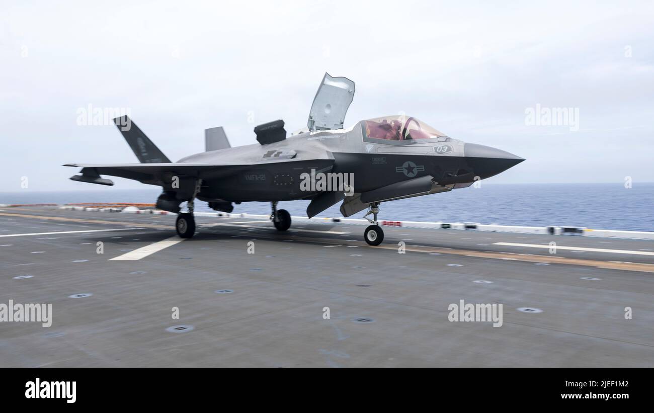 A U.S. Marine Corps F-35B Lightning II aircraft with Marine Fighter Attack Squadron (VMFA) 121 launches from the flight deck of the amphibious assault carrier USS Tripoli (LHA 7), while underway, June 11, 2022. Marines with VMFA-121, based out of Marine Corps Air Station Iwakuni, Japan, are conducting flight operations within U.S. 7th Fleet in support of a free and open Indo-Pacific. (U.S. Marine Corps photo by Sgt. Jackson Ricker) Stock Photo
