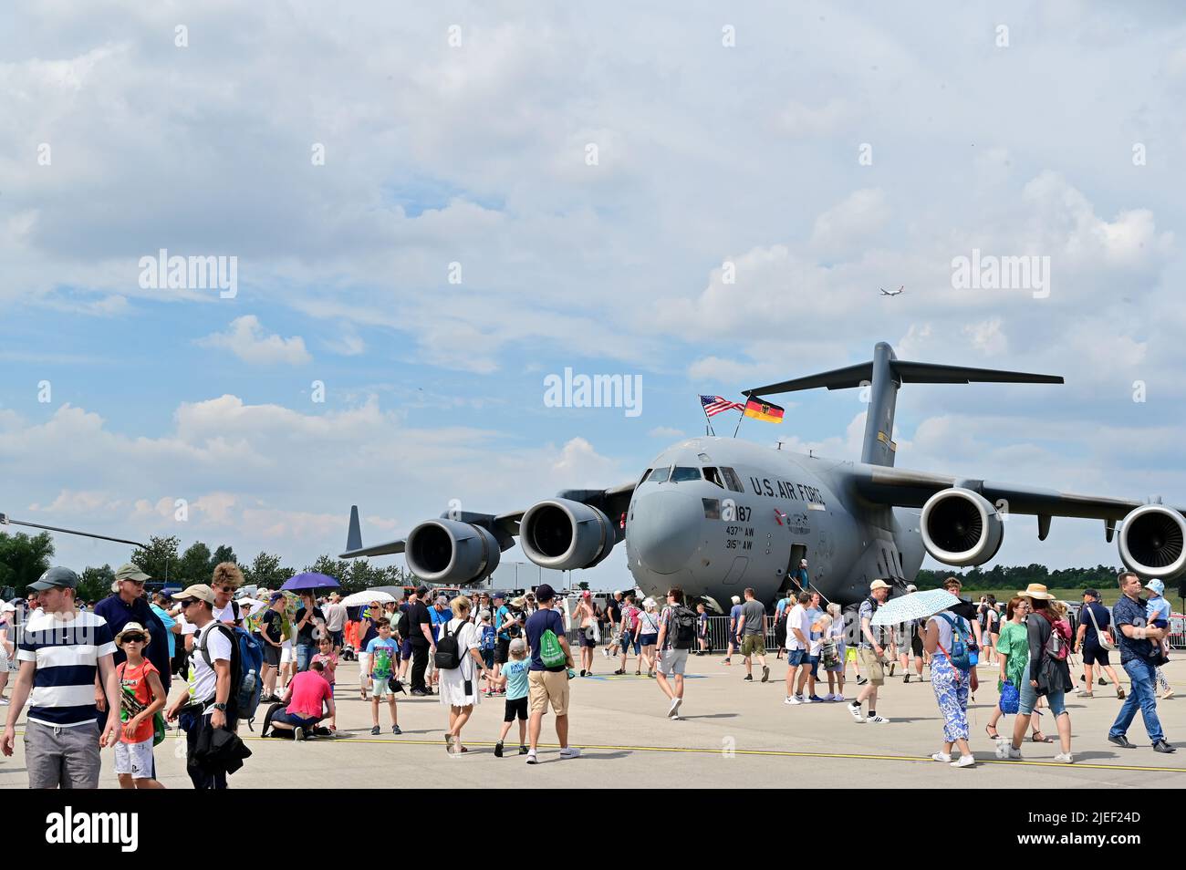 A U.S. C-17 Globemaster III Spirit of Berlin from the 315th Airlift Wing, Joint Base Charleston, South Carolina, participates as a static aircraft during the Innovation and Leadership in Aerospace Berlin, held at the Berlin Expo Center Airport, Berlin Brandenburg International Airport, June 26, 2022. Other rotary and fixed wing military aircraft on display at the show included F-15E Strike Eagle aircraft, F-16 Fighting Falcon aircraft, P-8A Poseidon aircraft, CH-53K King Stallion aircraft, CH-47F Chinook aircraft, AH-64E Apache, UH-60M Blackhawk aircraft and UH-70 Lakota aircraft, along with m Stock Photo