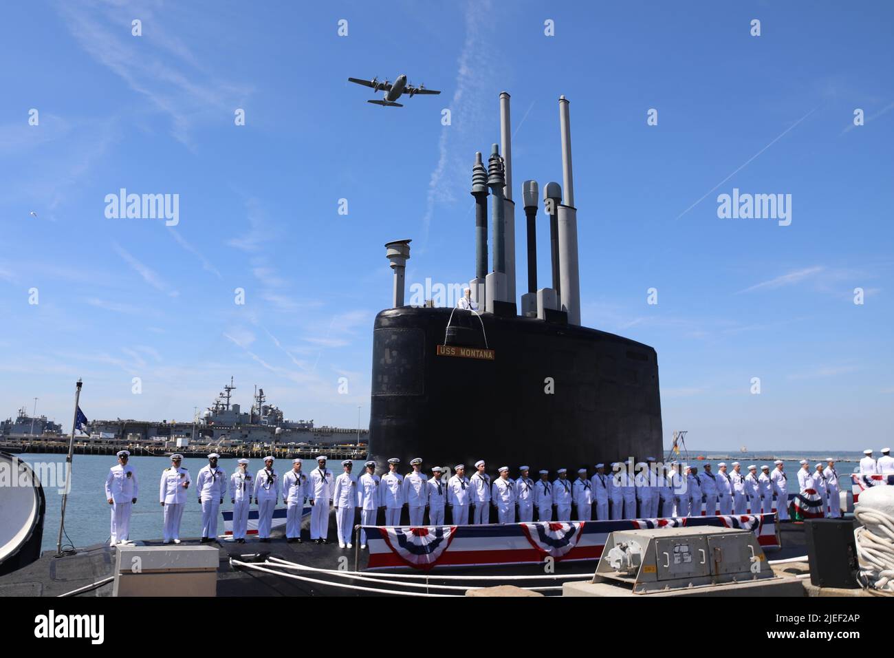 220625-N-UZ446-0251 NORFOLK, Virginia (June 25, 2022) – Crewmembers attached to the Virginia-class fast attack submarine USS Montana (SSN 794) man the ship during a commissioning ceremony in Norfolk, Va., June 25, 2022. SSN 794, the second U.S Navy ship launched with the name Montana and first in more than a century, is a flexible, multi-mission platform designed to carry out the seven core competencies of the submarine force: anti-submarine warfare; anti-surface warfare; delivery of special operations forces; strike warfare; irregular warfare; intelligence, surveillance and reconnaissance; an Stock Photo