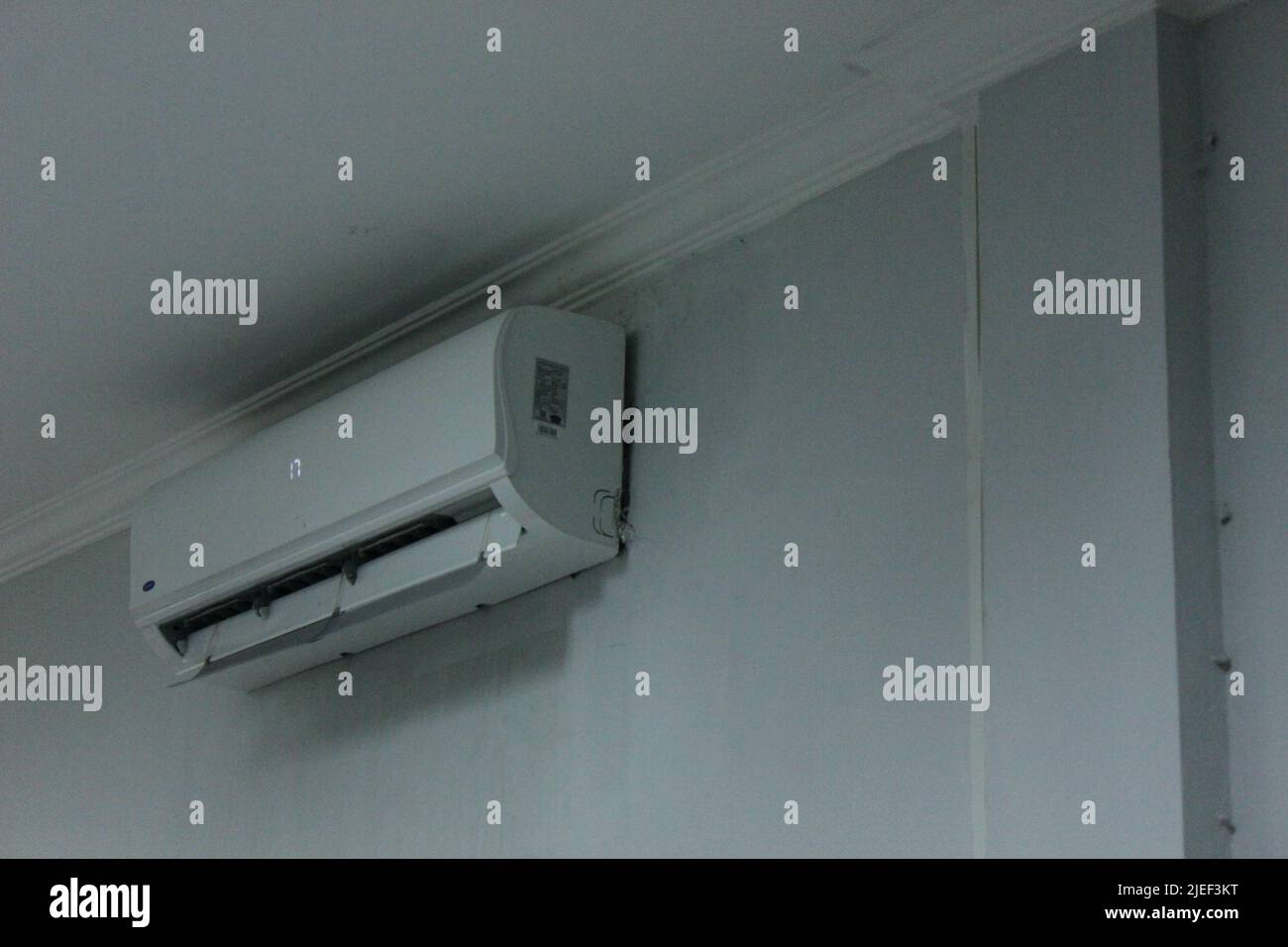 Photo of Air conditioner mounted on the wall Stock Photo Alamy