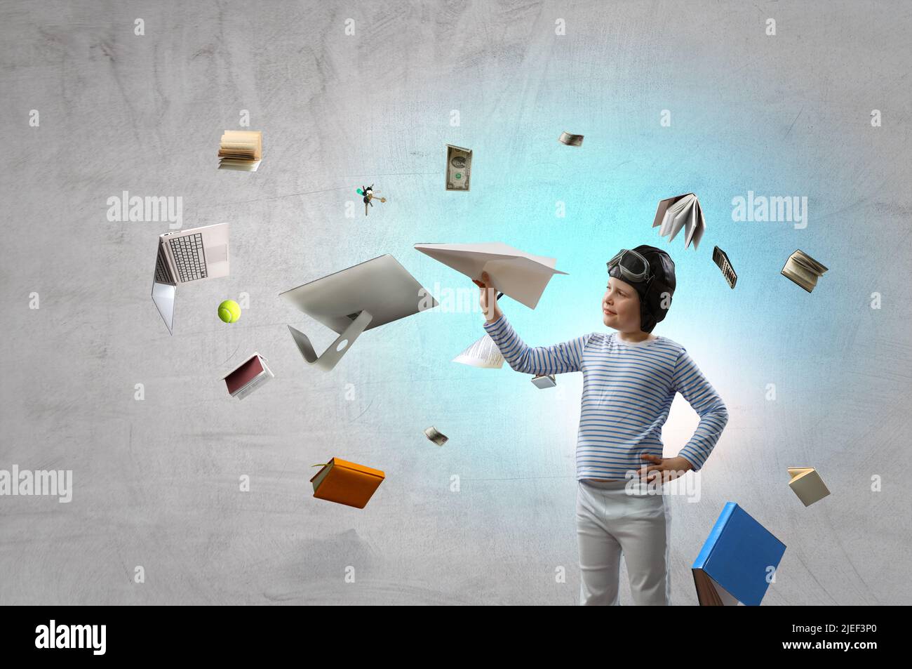 Playing With Paper Happy kid playing with paper airplane Stock Photo - Alamy