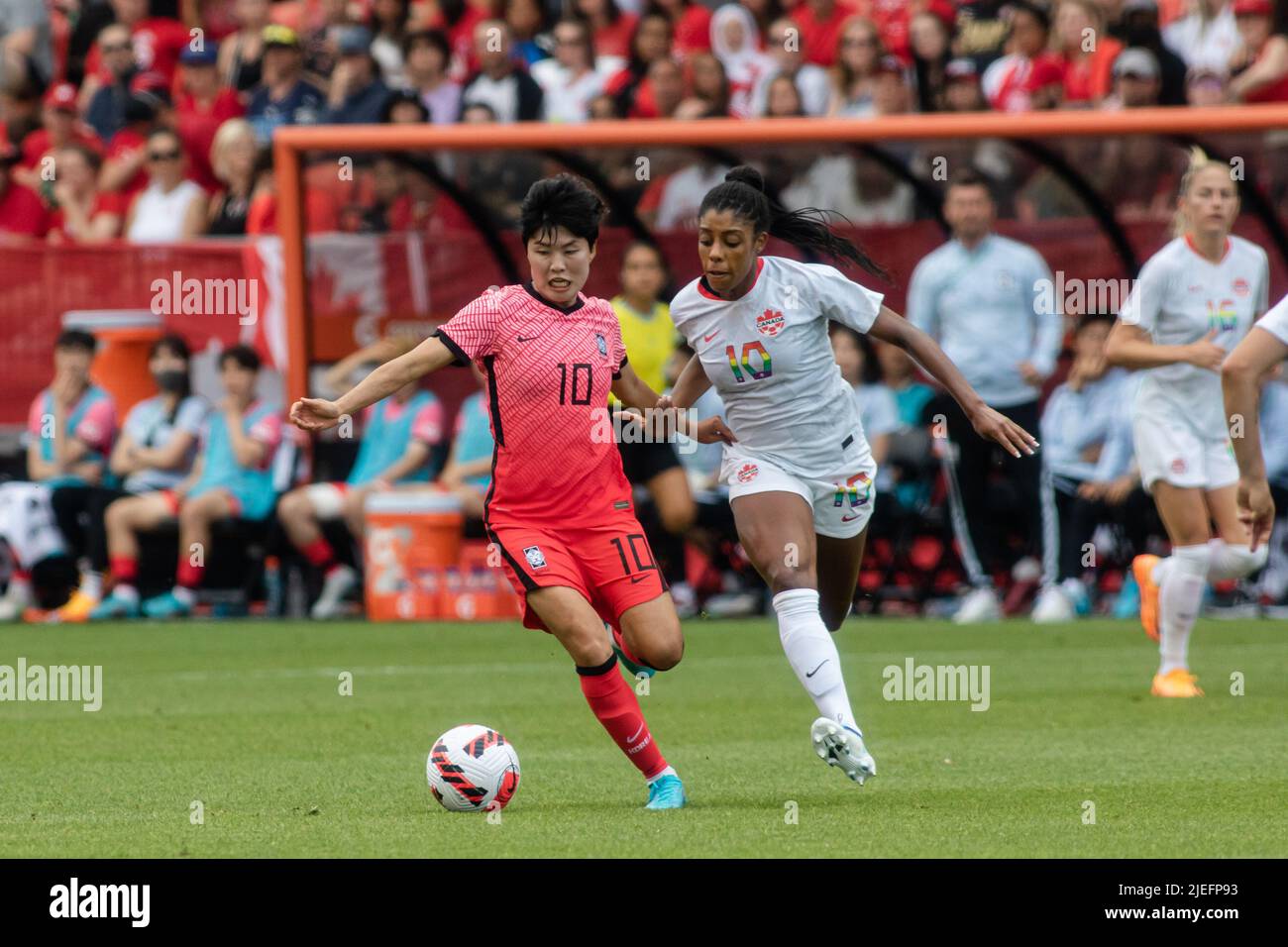 Toronto, Canada, June 26, 2022: Ji So-yun (left) of Team Korea Republic in action against Ashley Lawrence (right) of Team Canada during the International Friendly Match at BMO Field in Toronto, Canada. Canada and Korea draw 0-0. Credit: Phamai Techaphan/Alamy Live News Stock Photo
