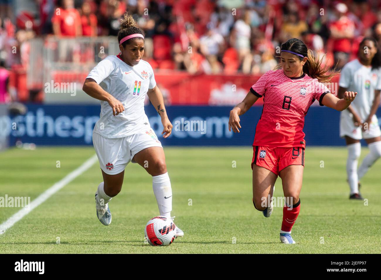 Toronto, Canada, June 26, 2022: Desiree Scott (left) of Team Canada and Cho So-hyun (right) of Team Korea Republic compete for the ball during the International Friendly Match at BMO Field in Toronto, Canada. Canada and Korea draw 0-0. Credit: Phamai Techaphan/Alamy Live News Stock Photo