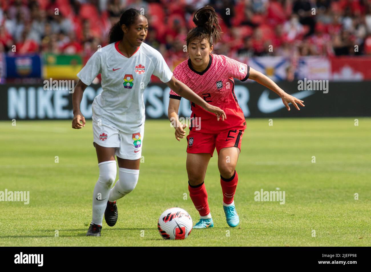 Toronto, Canada, June 26, 2022: Jayde Riviere (left) of Team Canada and Hyo-Joo Choo (right) of Team Korea Republic compete for the ball during the International Friendly Match at BMO Field in Toronto, Canada. Canada and Korea draw 0-0.Credit: Phamai Techaphan/Alamy Live News Stock Photo