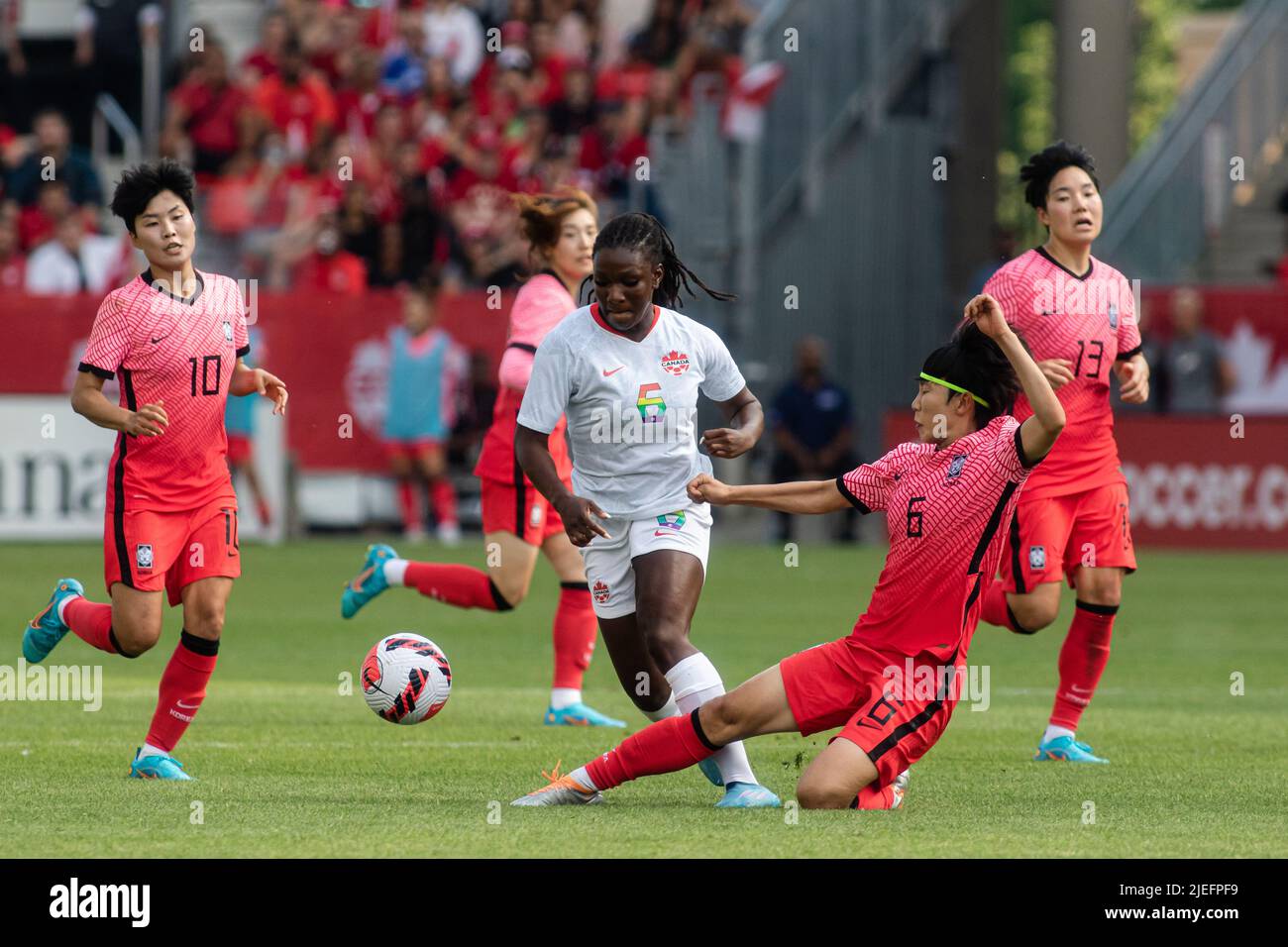 Toronto, Canada, June 26, 2022: Deanne Rose (No. 6, white) of Team Canada competes for the ball against Lim Seon-Joo (No. 6, red) during the International Friendly Match at BMO Field in Toronto, Canada. Canada and Korea draw 0-0. Credit: Phamai Techaphan/Alamy Live News Stock Photo