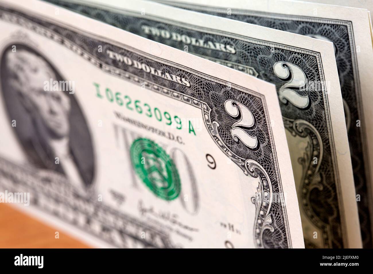 American money - 2 dollars a business background Stock Photo