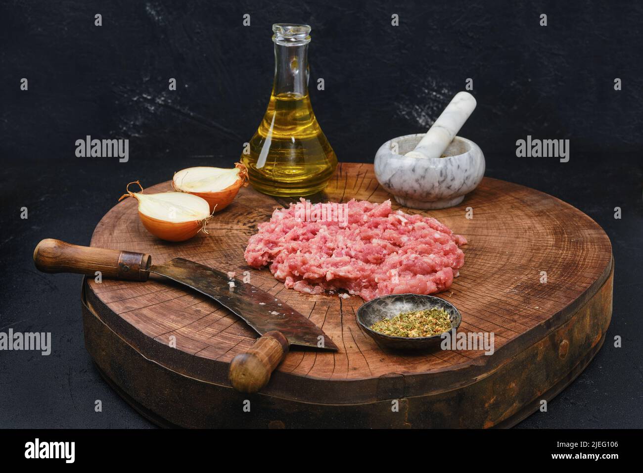 Making fresh raw beef mince meat with chopping knife Stock Photo Alamy