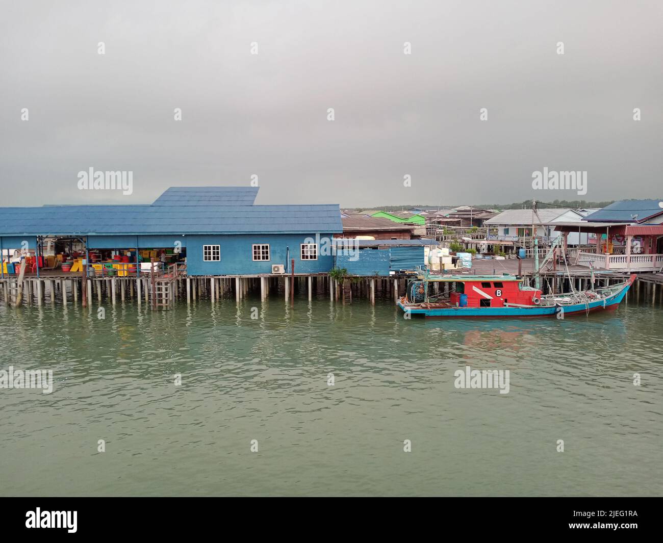 Fishing boats in the port of a small fishing village by the sea Stock