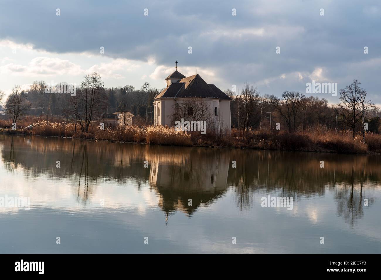 Kostel sv. Petra z Alkantary church with pond in Karvina city in Czech republic Stock Photo