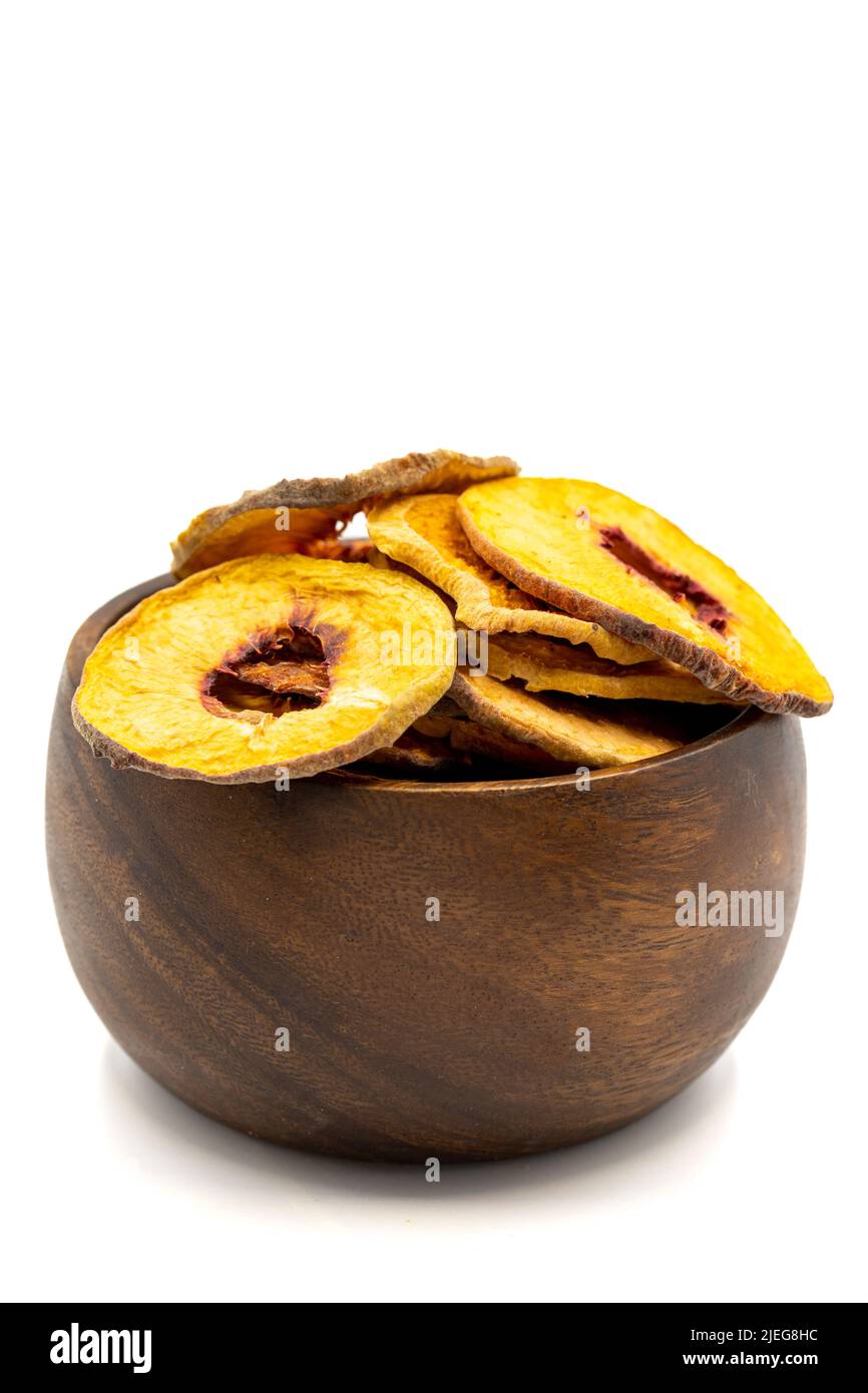 Dried peach slices. Sliced dry peach isolated on white background. Sun