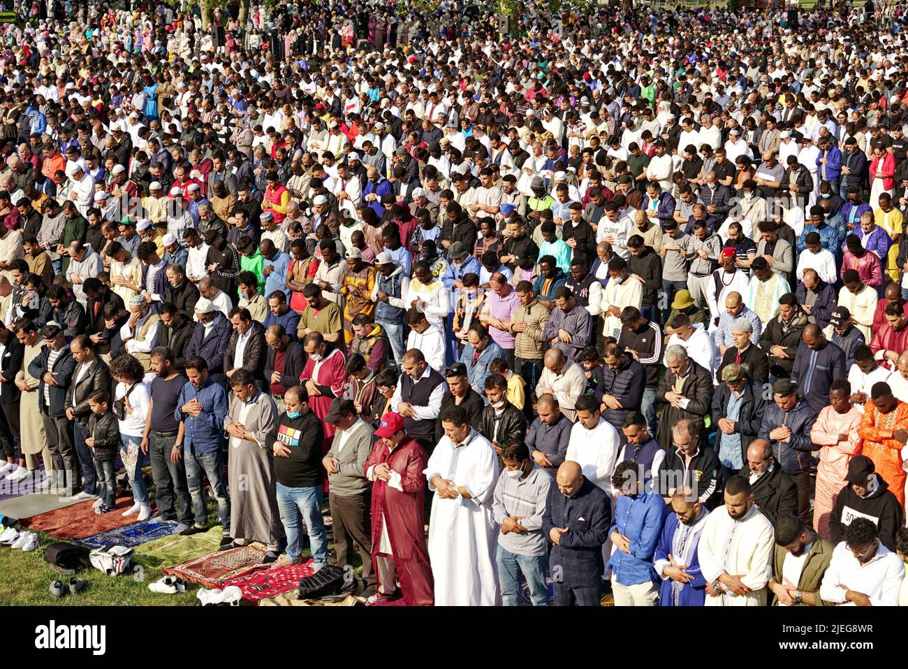 Muslims praying to celebrate the end of Ramadan. Turin, Italy - May 2022 Stock Photo