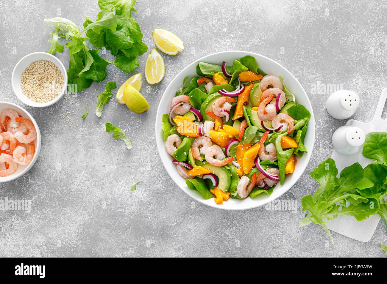 Shrimp, avocado and mango salad with fresh green lettuce. Prawn salad Stock Photo