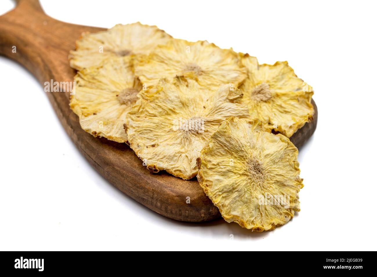 Dried pineapple slices. Sliced dry pineapple isolated on white background. Sundried fruit