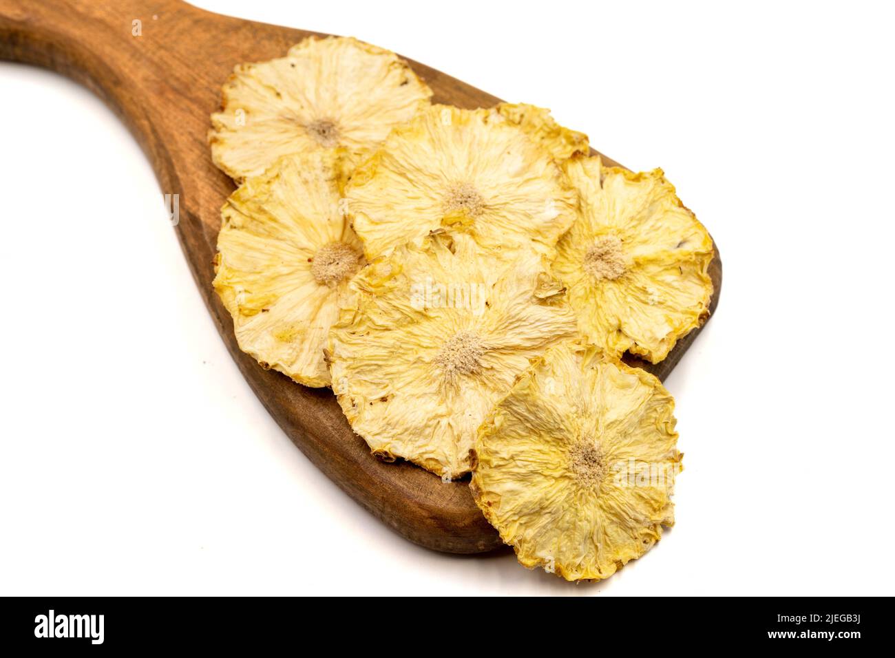 Dried pineapple slices. Sliced dry pineapple isolated on white background. Sundried fruit