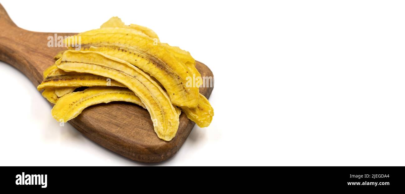 Dried banana slices. Sliced dried banana isolated on white background