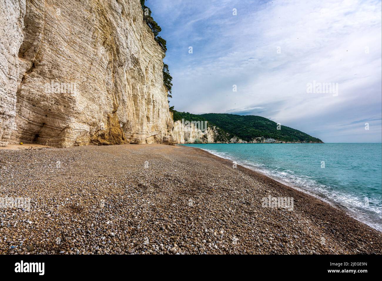 The high and white limestone cliff of Vignanotica beach in Puglia. Vieste, Foggia province, Puglia, Italy, Europe Stock Photo