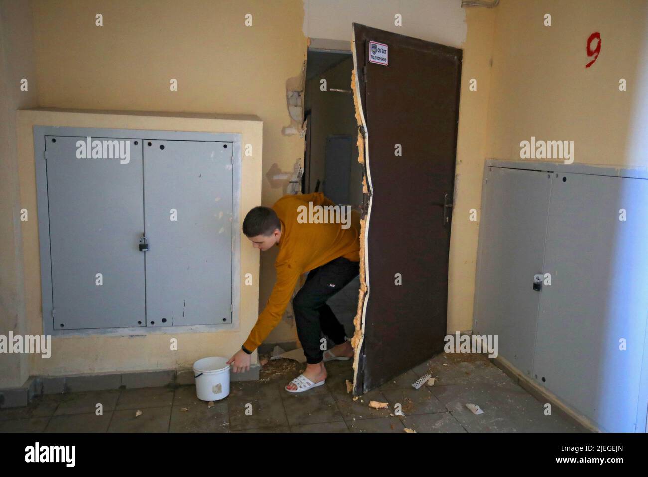 A man is seen in the corridor of a damaged apartment block after the Russian troops shelled a northern neighbourhood with a BM-30 Smerch multiple rocket launcher, Kharkiv, northeastern Ukraine, June 26, 2022. Photo by Vyacheslav Madiyevskyy/Ukrinform/ABACAPRESS.COM Stock Photo