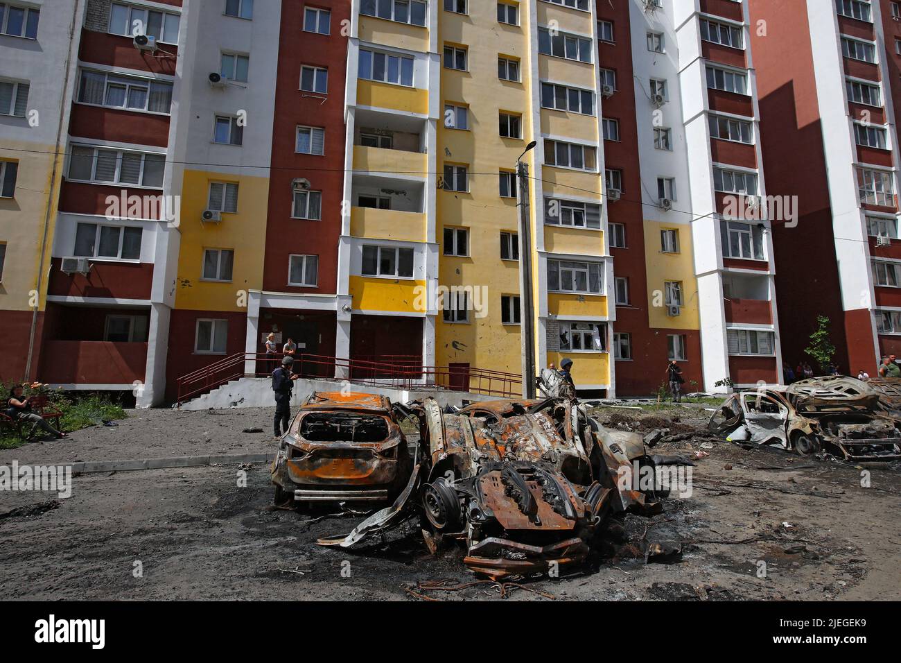 Burnt-out cars are pictured in the yard of an apartment block after the shelling of a northern neighbourhood by Russian troops with a BM-30 Smerch multiple rocket launcher, Kharkiv, northeastern Ukraine, June 26, 2022. Photo by Vyacheslav Madiyevskyy/Ukrinform/ABACAPRESS.COM Stock Photo