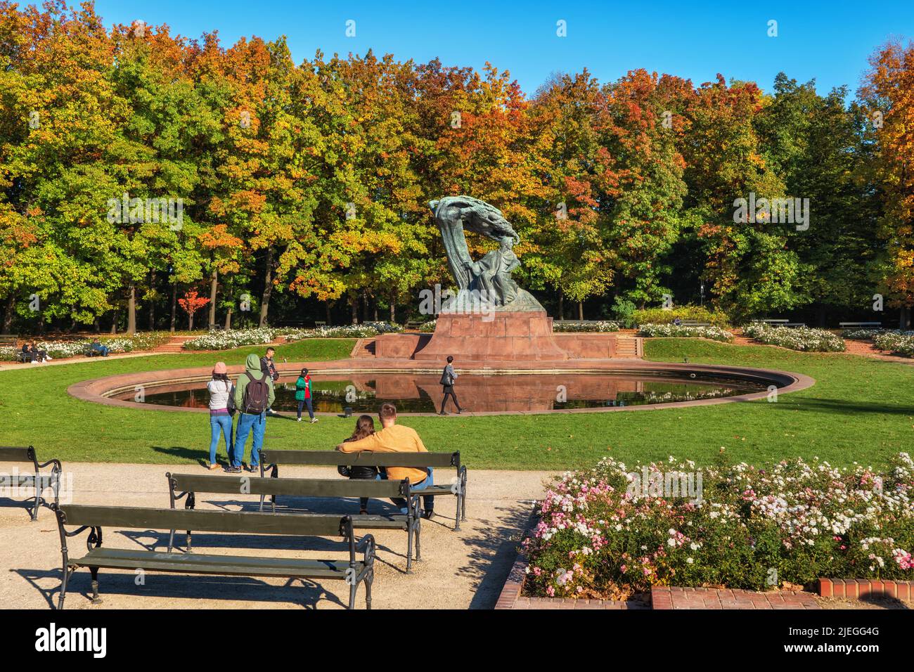 Warsaw, Poland - October 8, 2021: Royal Lazienki Park in autumn with Frederic Chopin Monument by the pond. Stock Photo