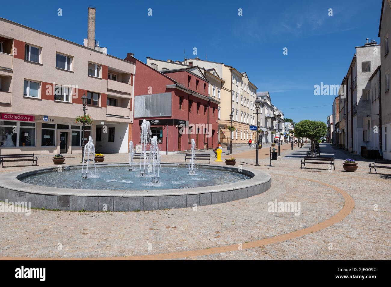 Ciechanow, Masovia, Poland - June 5, 2022: Square with fountain on Warszawska Street in the city center. Stock Photo