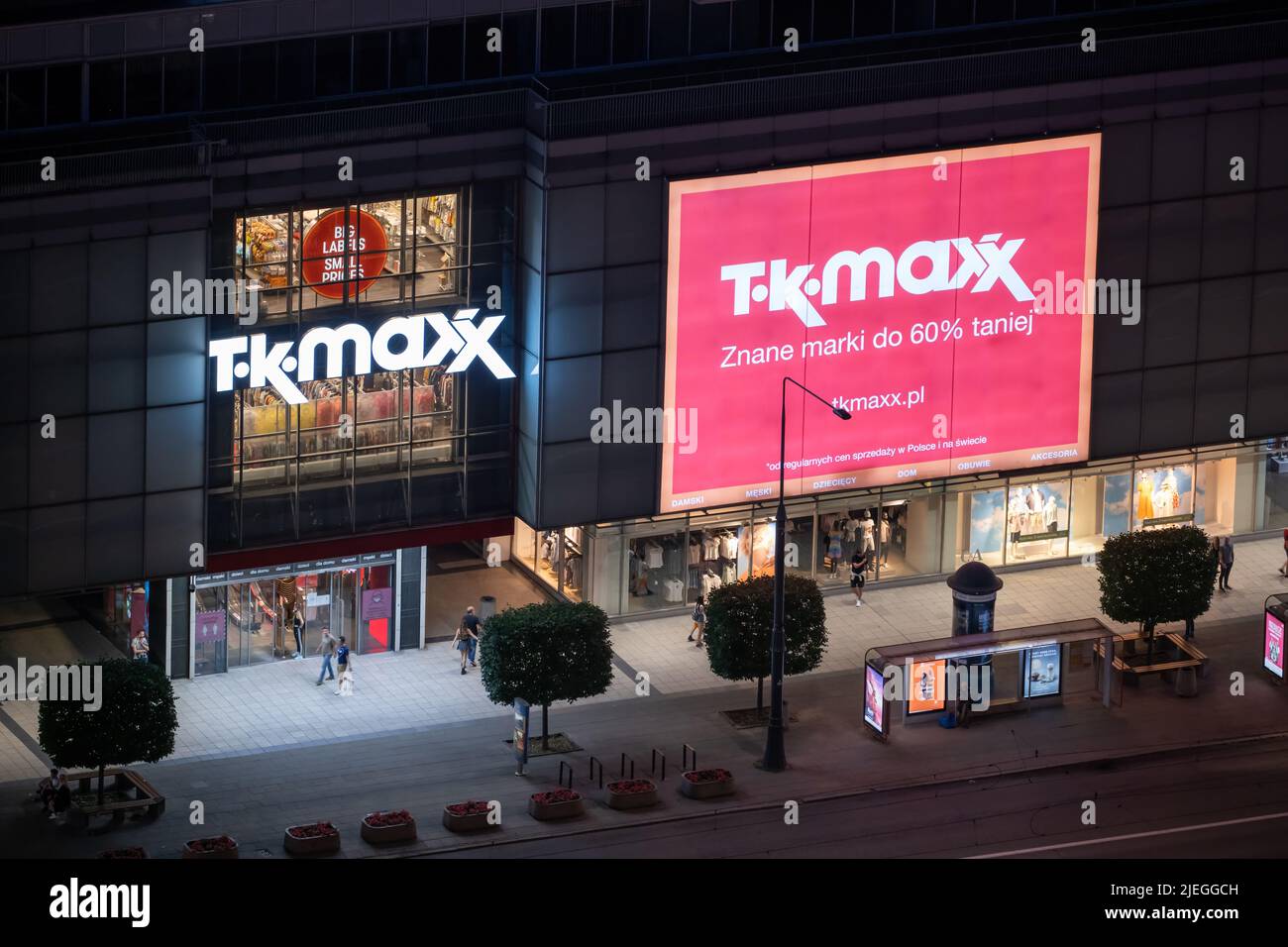 Warsaw, Poland - June 18, 2021: TK Maxx American department store in the city center at night, view from Marszalkowska Street. Stock Photo