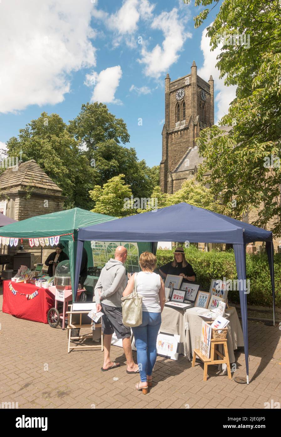 People shopping at the Artisan Market near St John's church in Heaton Mersey, Greater Manchester, England, UK Stock Photo