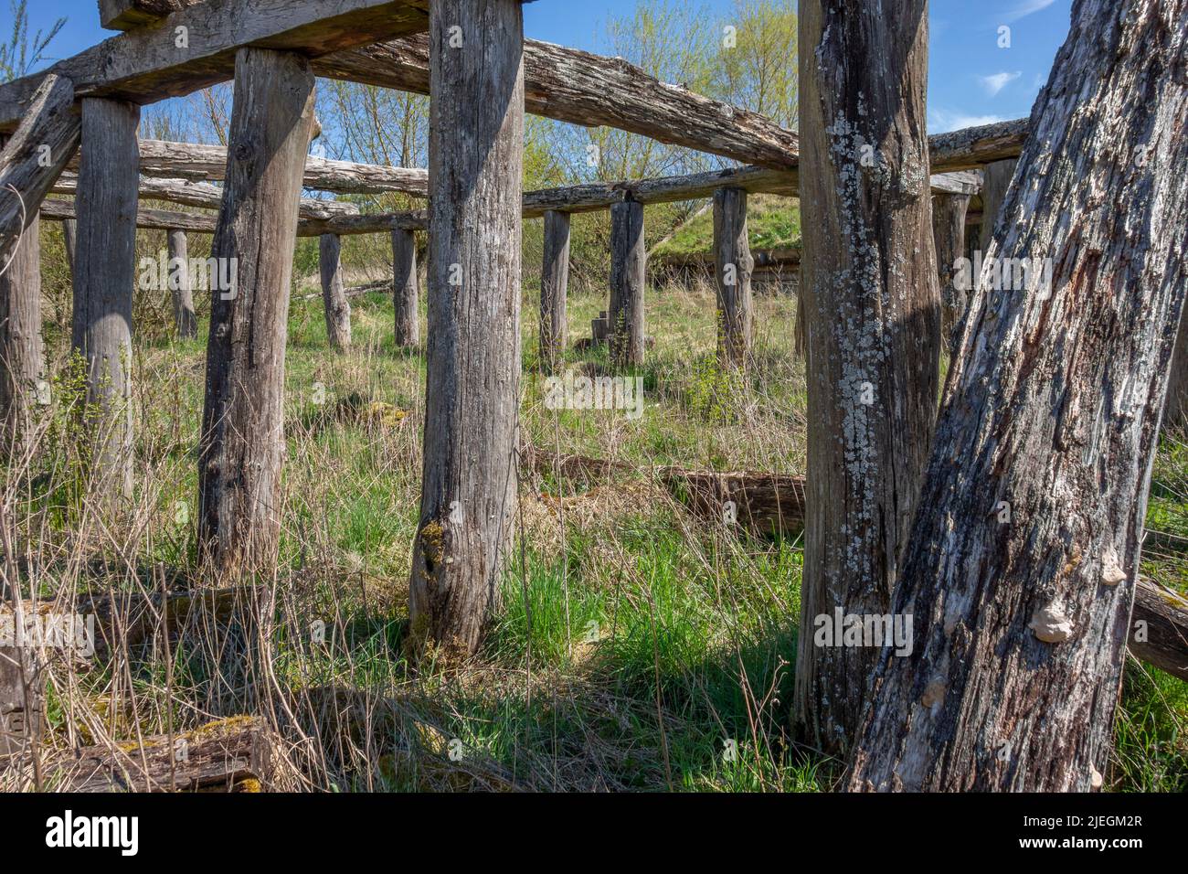 Medieval Spring House Rundown medieval wooden building remains in sunny ambiance at early ...