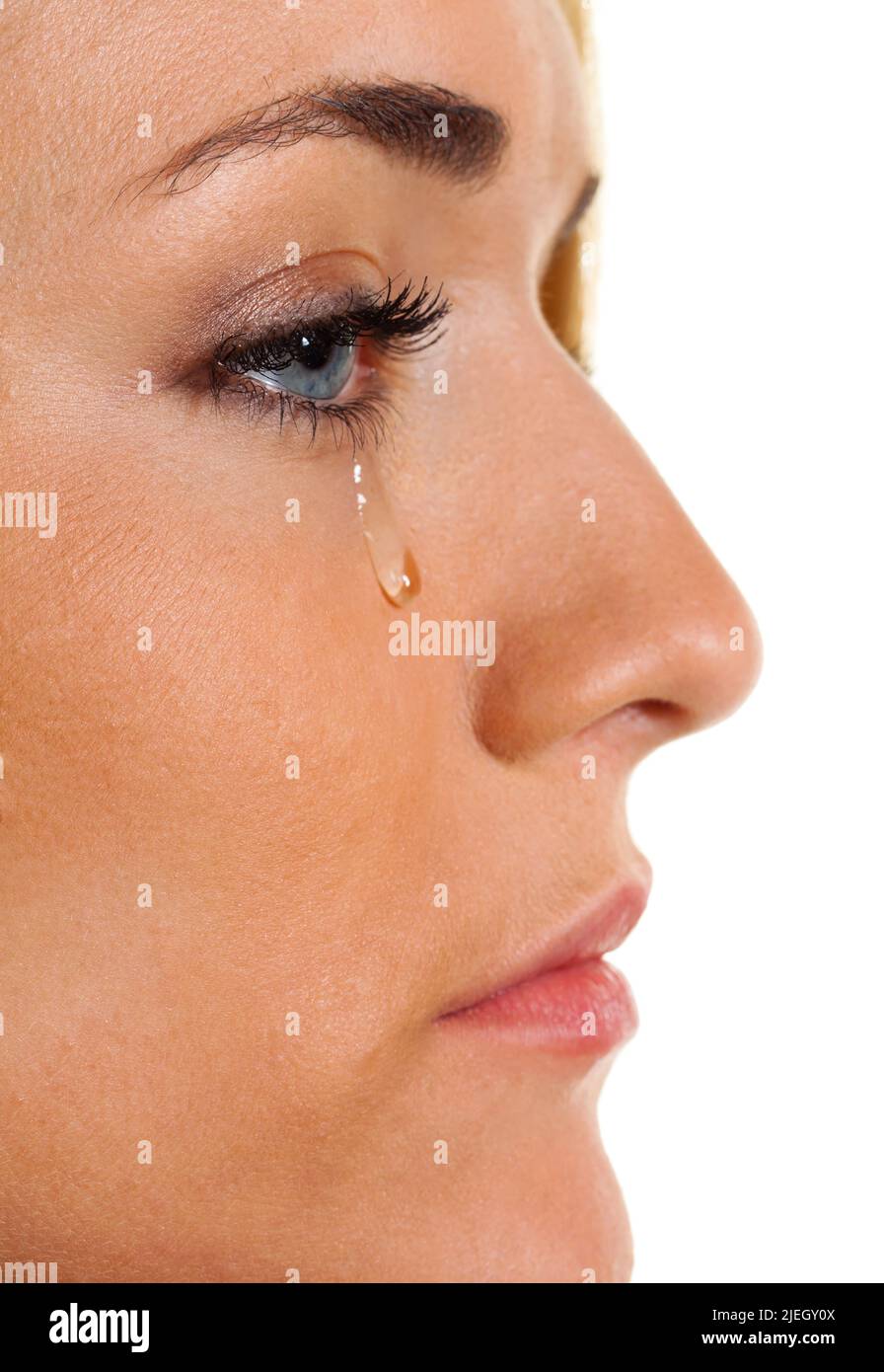Eine traurige Frau weint Tr‰ne. Symbolphoto Angst, Gewalt, Depression Stock Photo