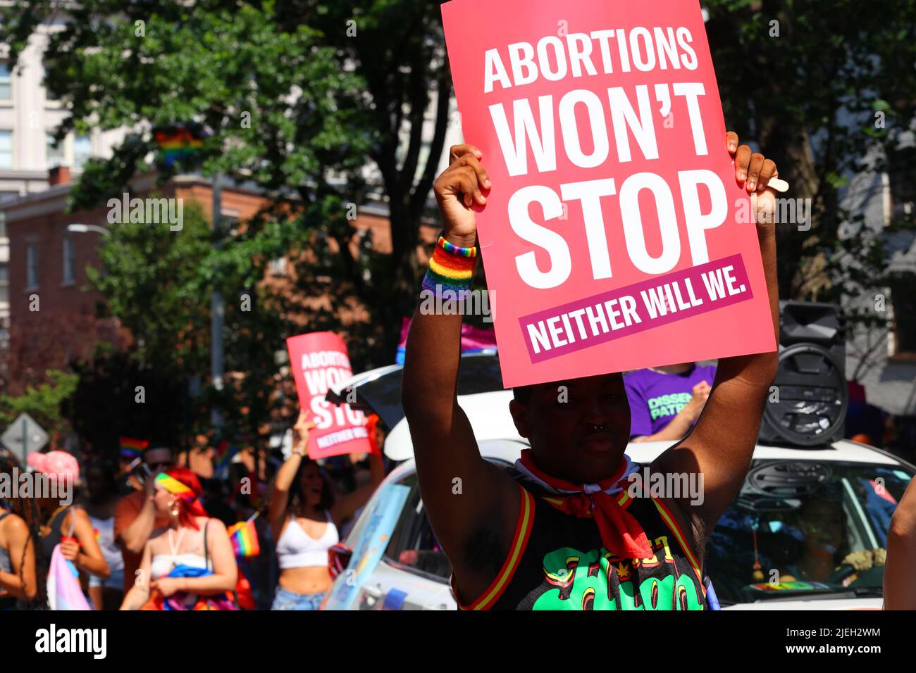 New York, June 26, 2022. A person holds a sign, "Abortions Won't Stop Neither Will We" at NYC Pride a few days after the overturning of Roe v. Wade. Stock Photo