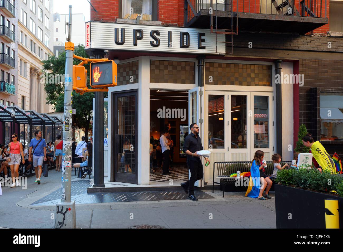 Upside Pizza, 51 Spring St, New York, NY. exterior storefront of a pizza and soft serve ice cream shop in the Nolita neighborhood in Manhattan. Stock Photo