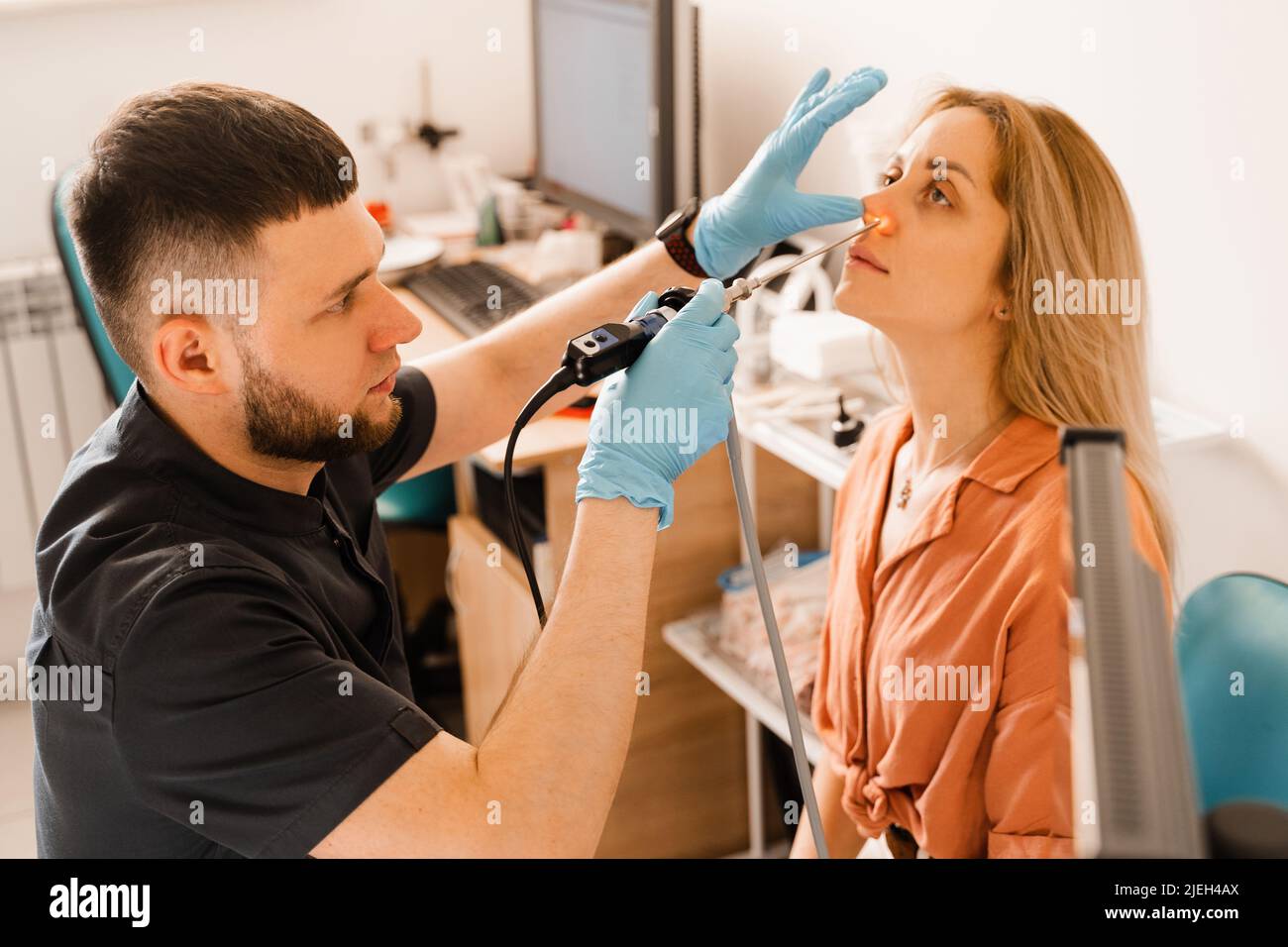Nose endoscopy. Rhinoscopy procedure with rhinoscope. ENT doctor