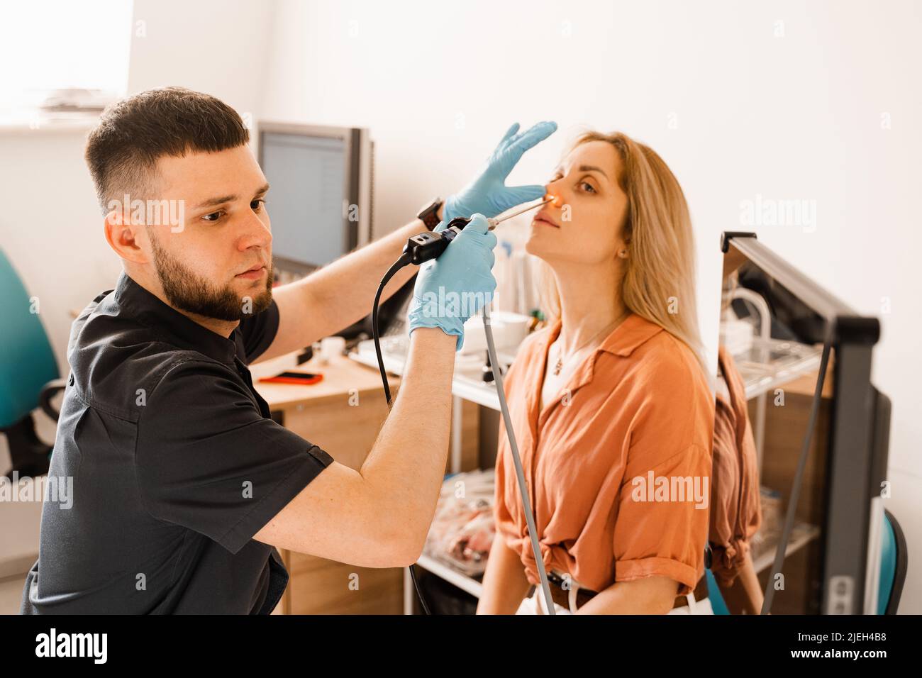 Nose endoscopy. Rhinoscopy procedure with rhinoscope. ENT doctor