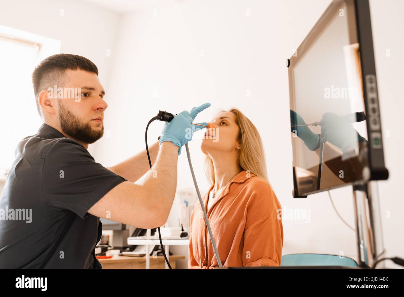 Nose endoscopy. Rhinoscopy procedure with rhinoscope. ENT doctor