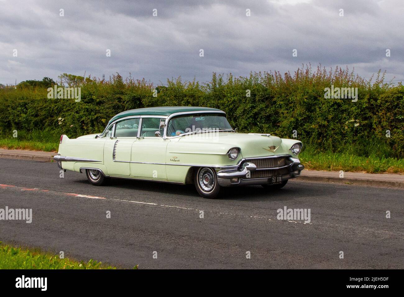 1956 50s fifties green Cadillac 6000cc American luxury car; en-route to Hoghton Tower for the Supercar Summer Showtime car meet which is organised by Great British Motor Shows in Preston, UK Stock Photo