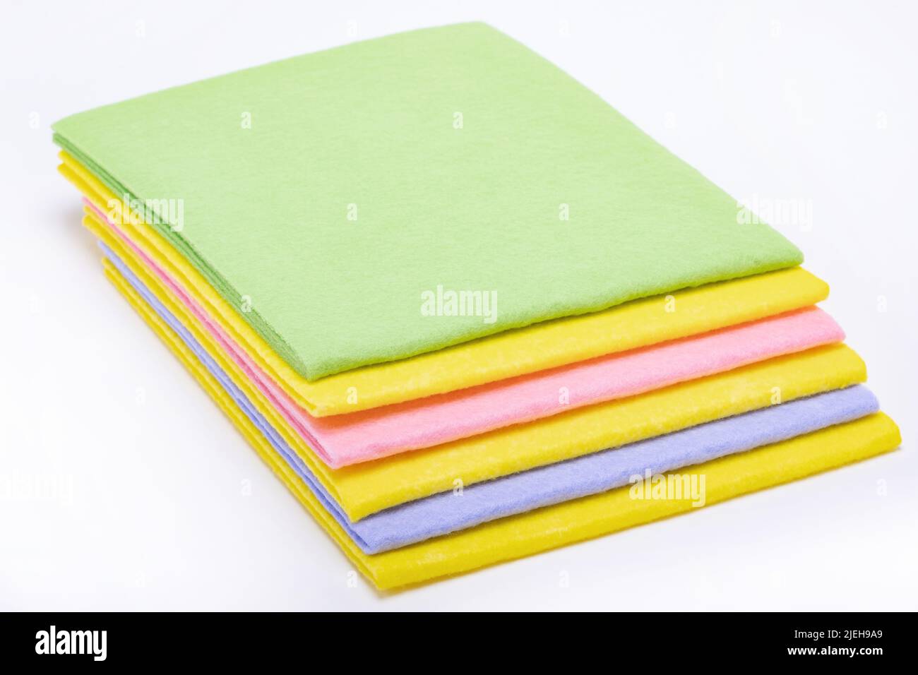 Multicolored cleaning cloths on the white background. Napkins for ...